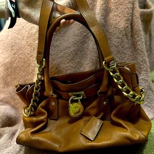 Michael Kors GUC purse.